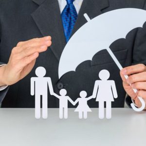 Family life insurance, financial security concept : Businessman protects family members e.g parents and two child, depicts protection from insurer, they will pay a lump sum for clearing burden of debt