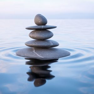 rocks-stacked-in-body-of-water